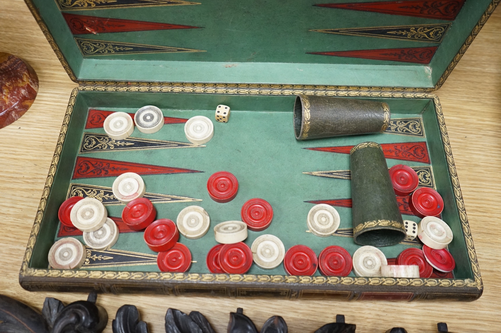 A backgammon games box, Sorrento box, a red wax seal mounted lid and a carved oak floral appliqué, 65cm wide (4)